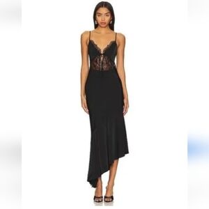 Black Dress with lace back and mid drift adjustable straps asymmetrical Hem
